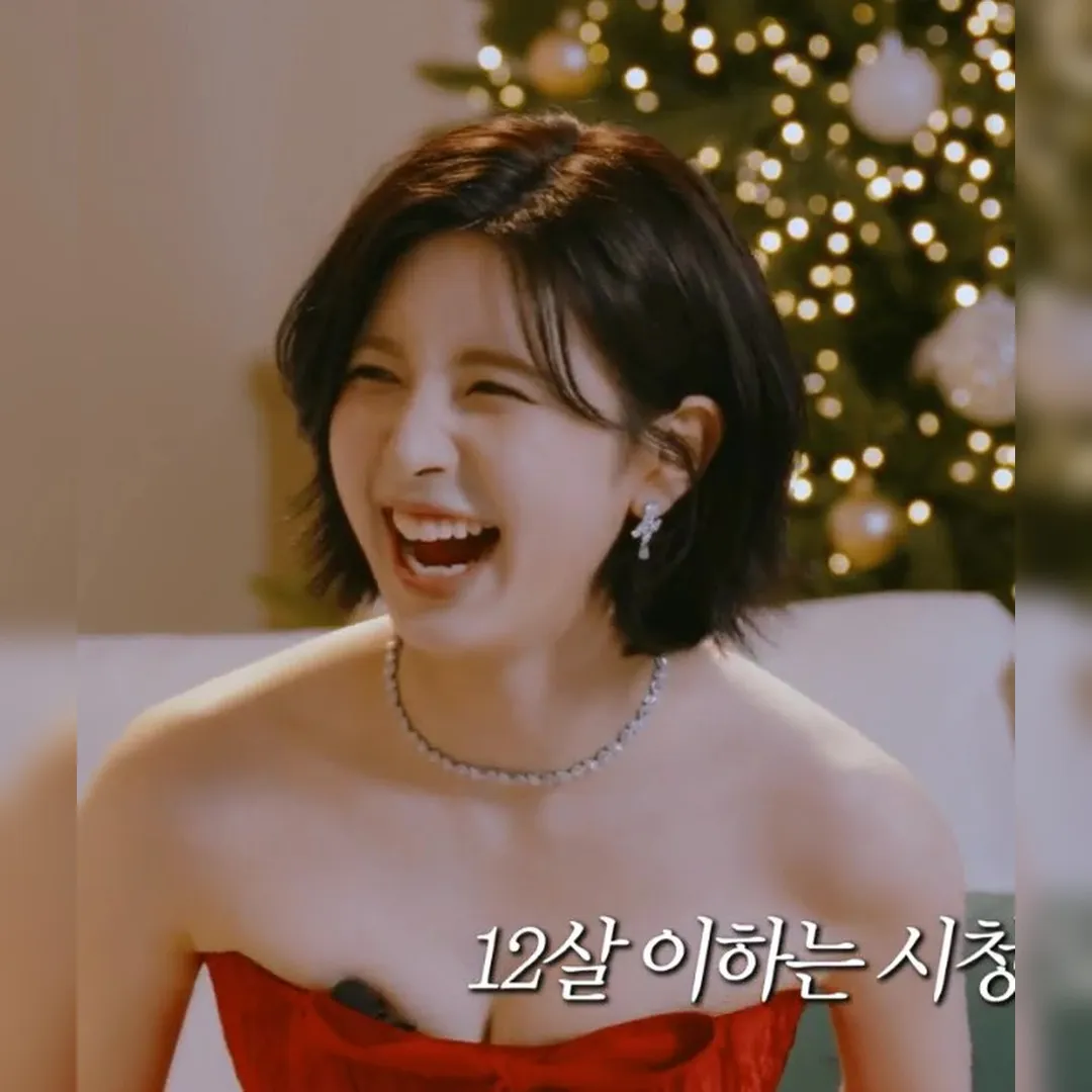 NMIXX Bae Rocks a Red Sheer Off-Shoulder Dress… Her Skin is Flawless!