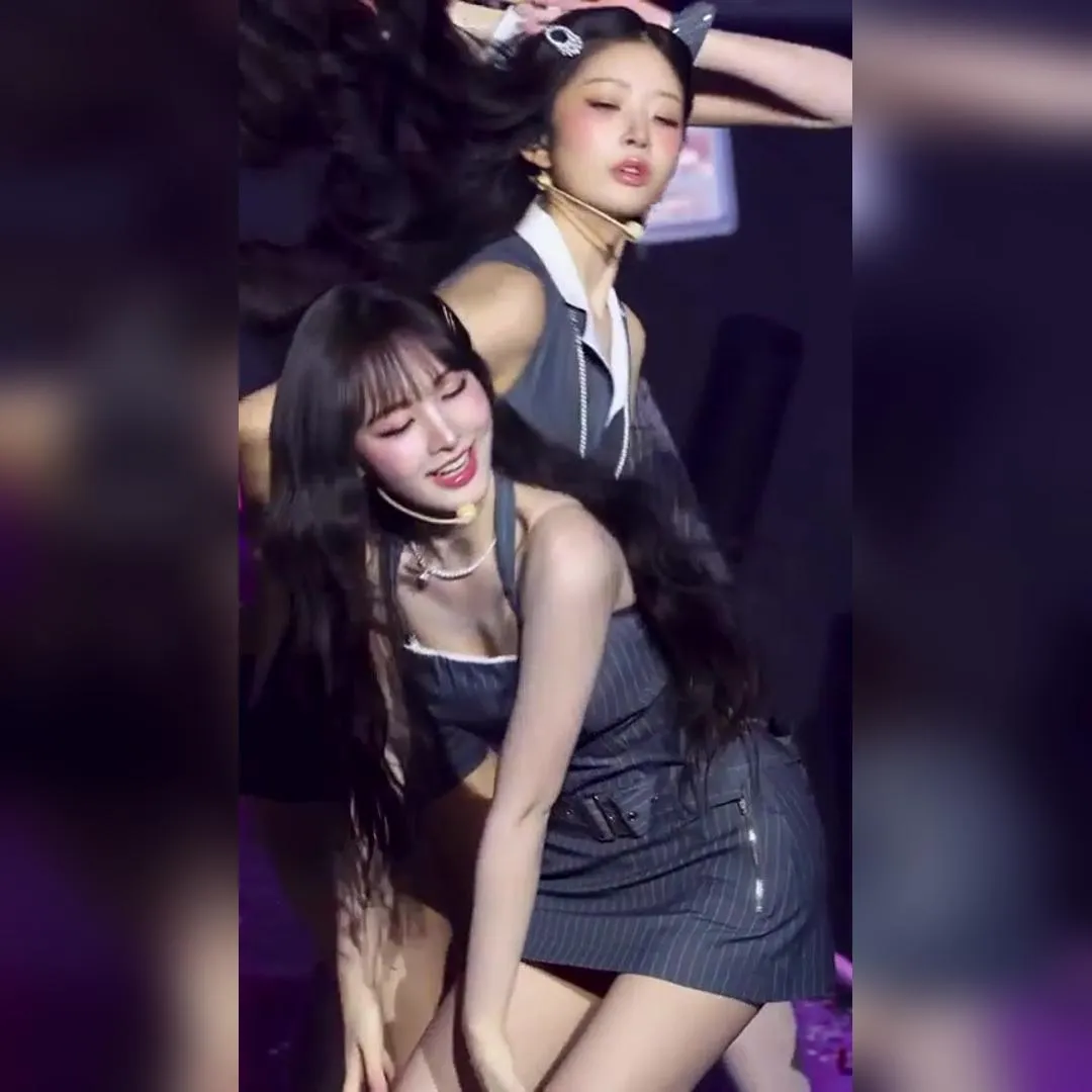 灰色條紋服裝展現微微的事業線與蜜大腿 IVE Liz