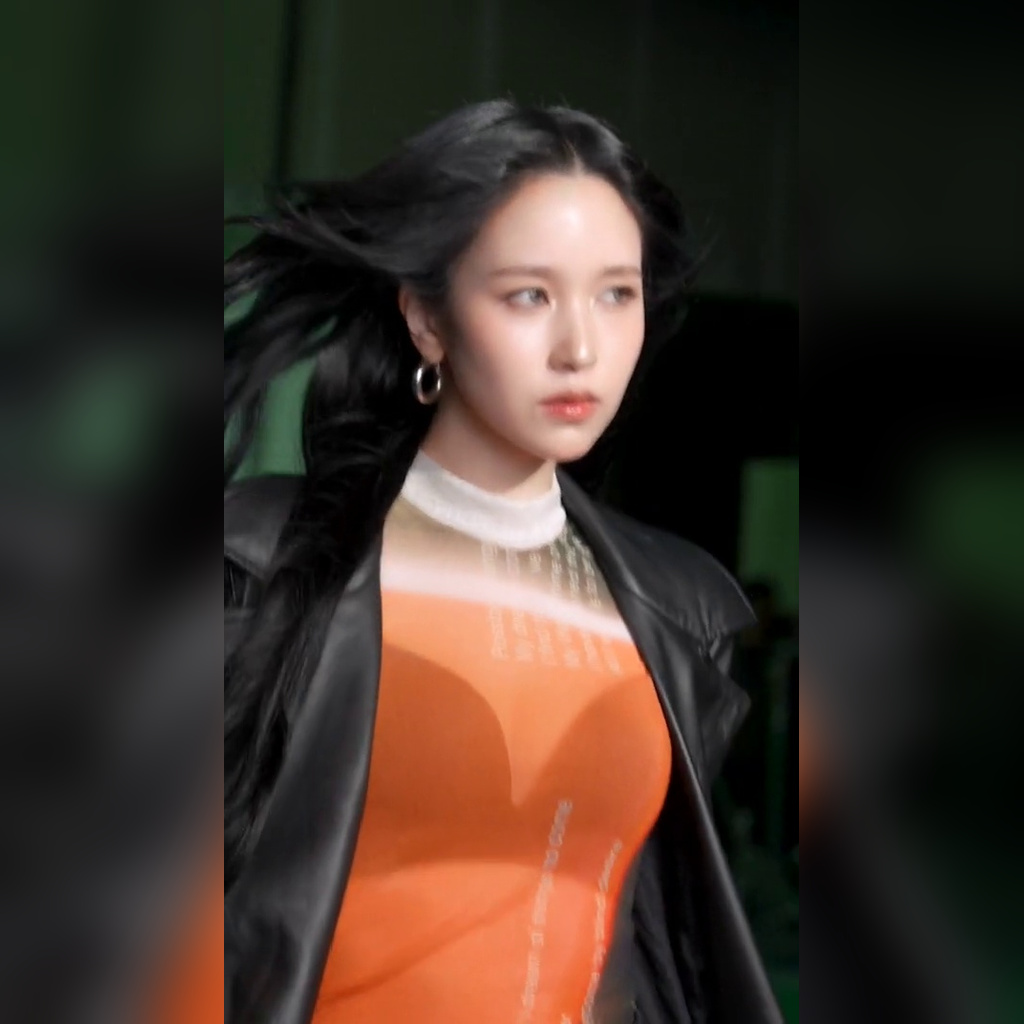 TWICE Mina Wearing a Bra Top While Modeling in an Orange Sheer Dress