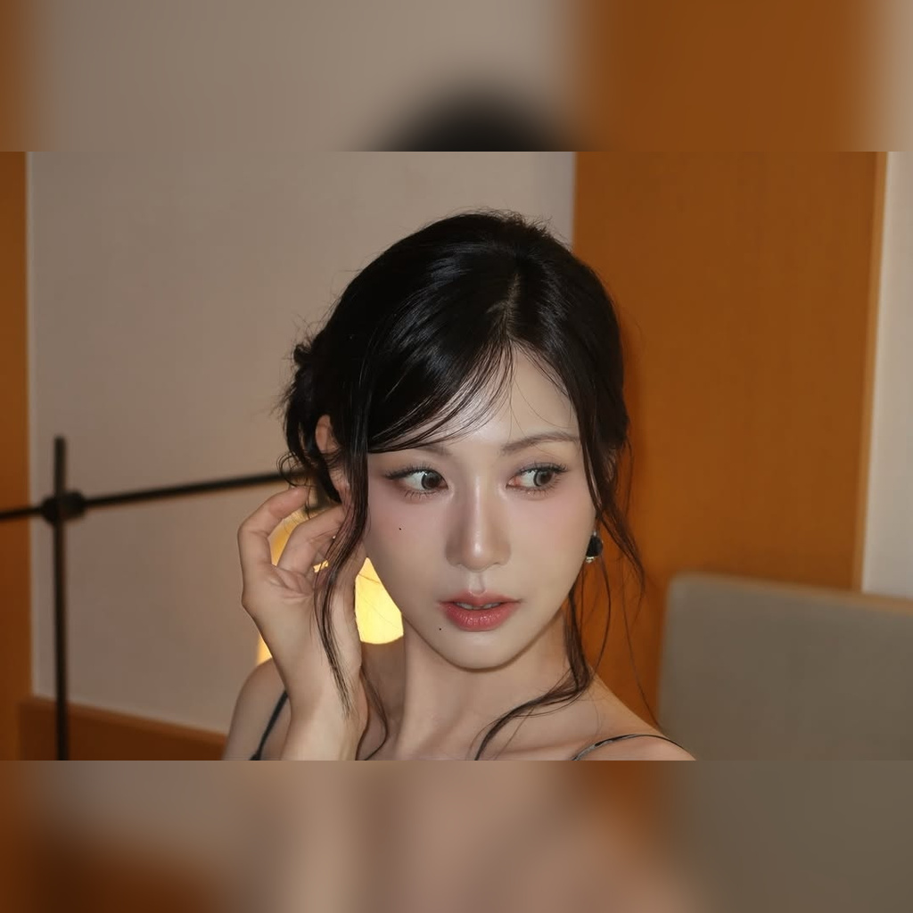 Oh Hyoung Lying Face-Down on the Bed Wearing a Black String Dress Subtle Cleavage Exposure