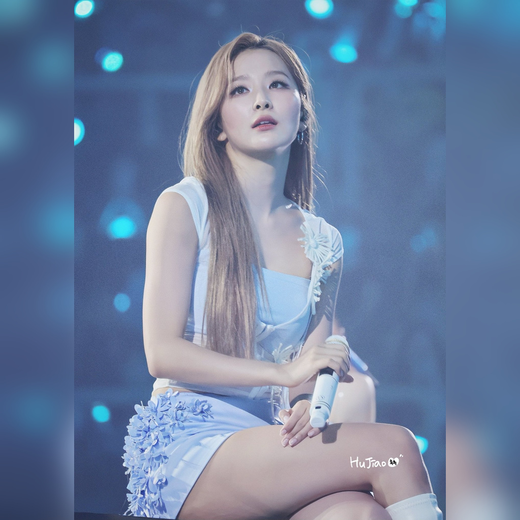 Red Velvet concert stage end: Seulgi sitting with her legs crossed