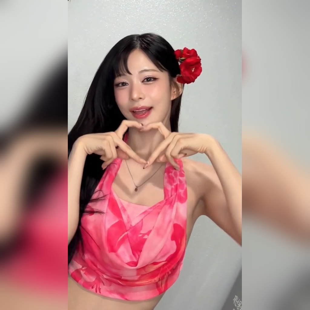 Lee Chae-young with a flower in her hair Red Hawaiian halter neck back tattoo legend