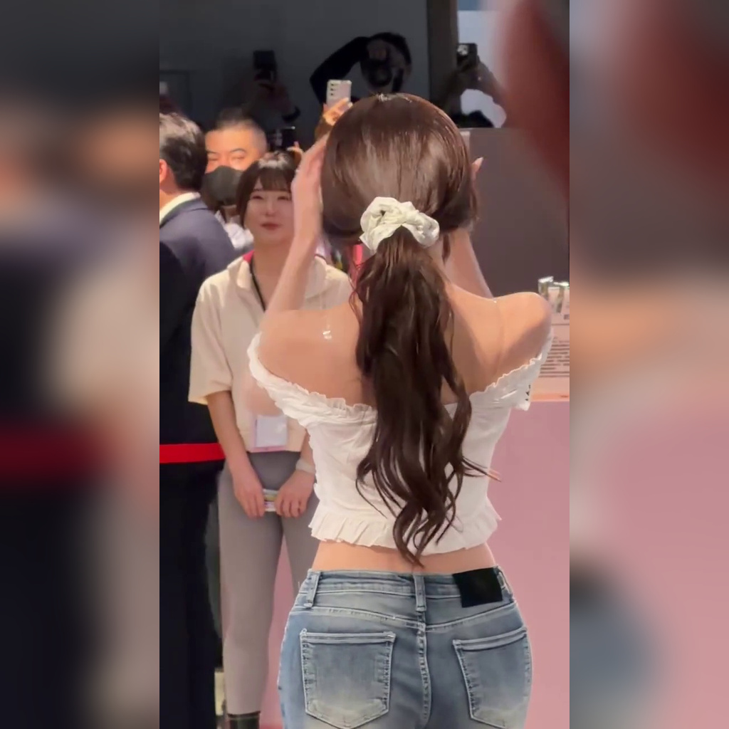 Itzy Yuna in a white off-shoulder top with hair tied up + jeans armpit shot