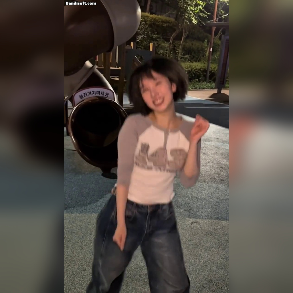 BIBI Gaeun of VIVIZ bouncing in a playful challenge, fluffy uplifted chest