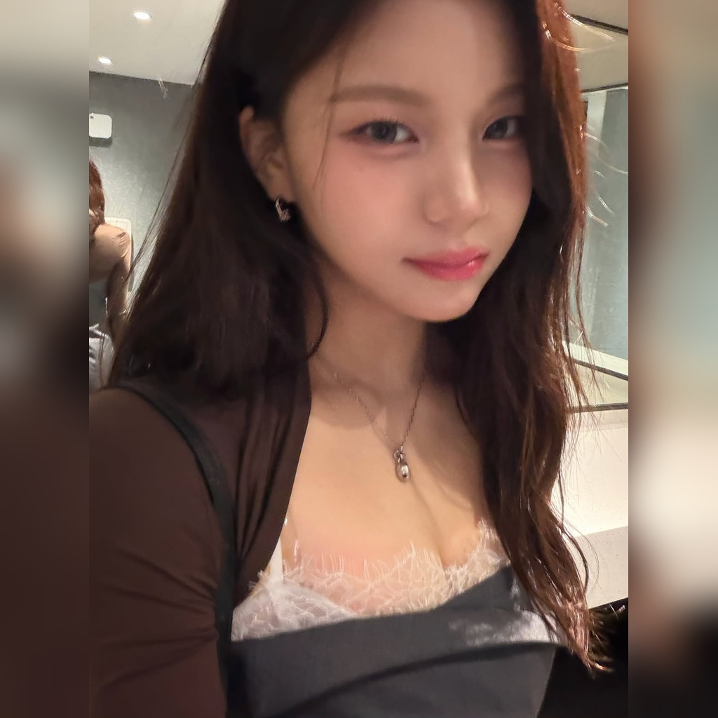 VIVIZ Umji Flaunts Just a Little Cleavage in a Gray Dress Lace