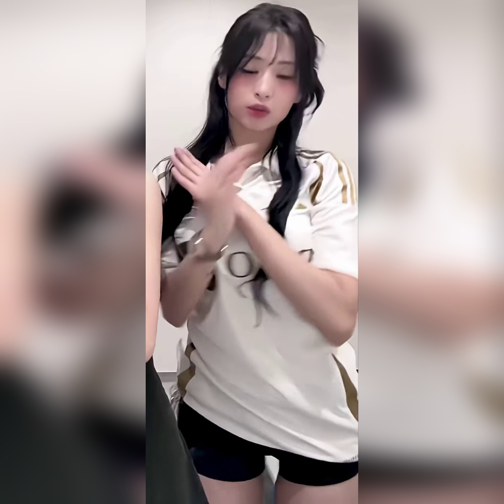 BABYMONSTER Ahyeon Wearing an LAFC Jersey and Shaking While Showing a Prominent Chest Line