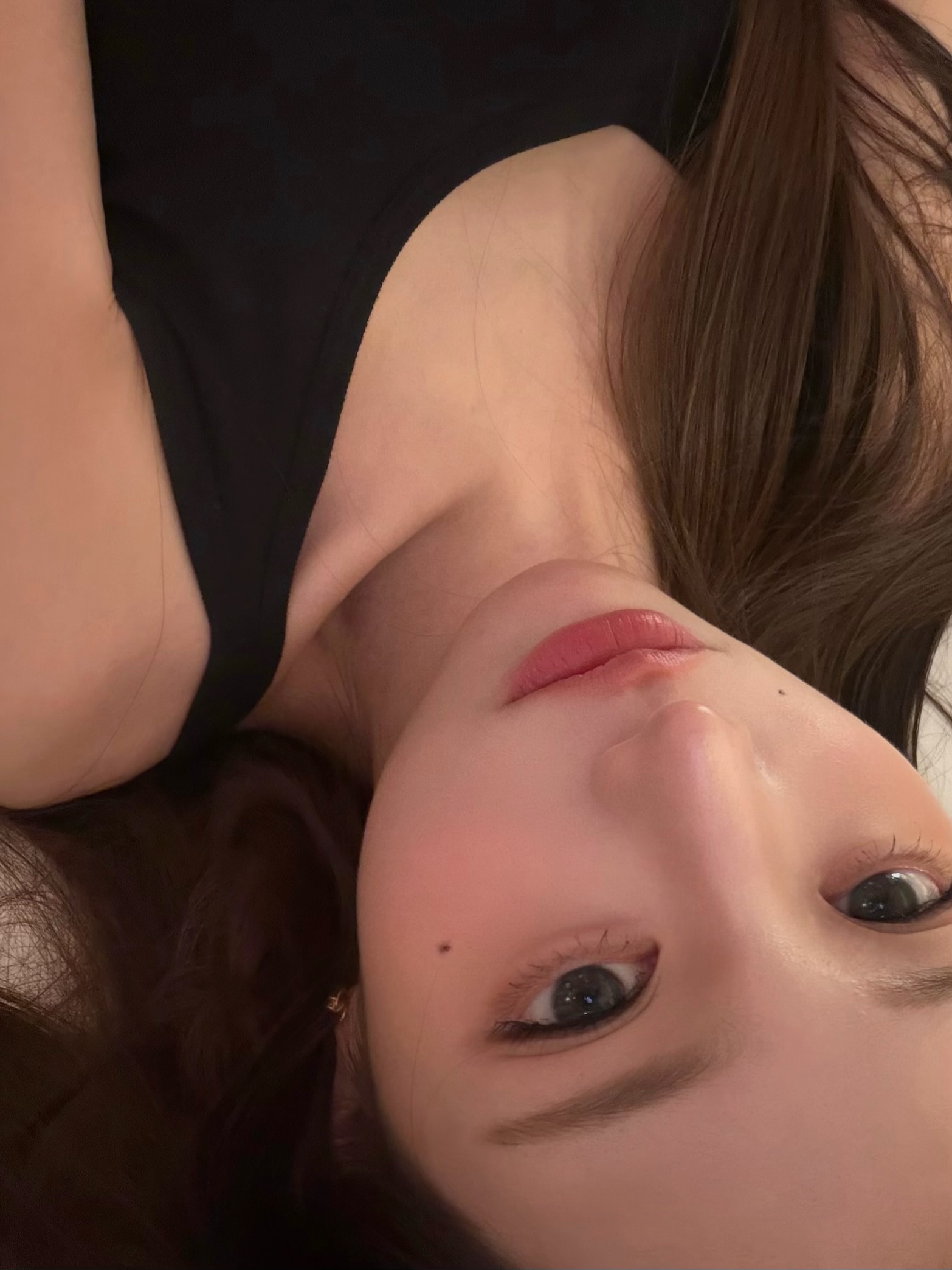 Jang Won-young Turns Up the Charm While Taking a Bed Selfie in a Black Dress