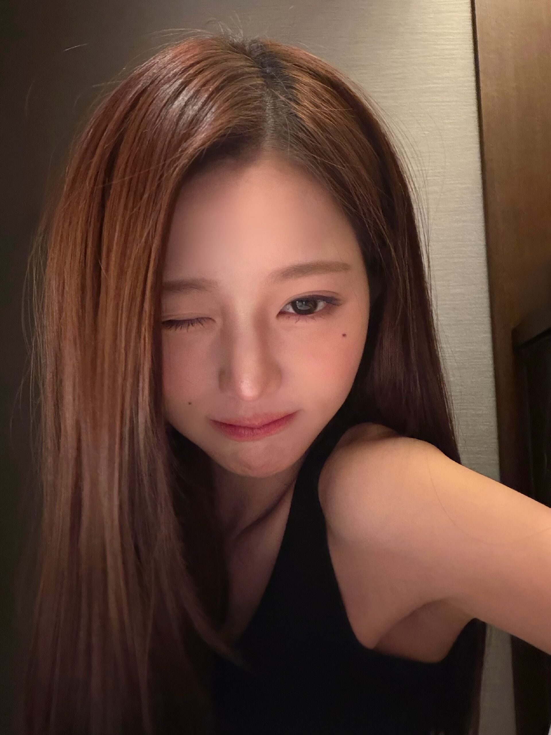 Jang Won-young Turns Up the Charm While Taking a Bed Selfie in a Black Dress