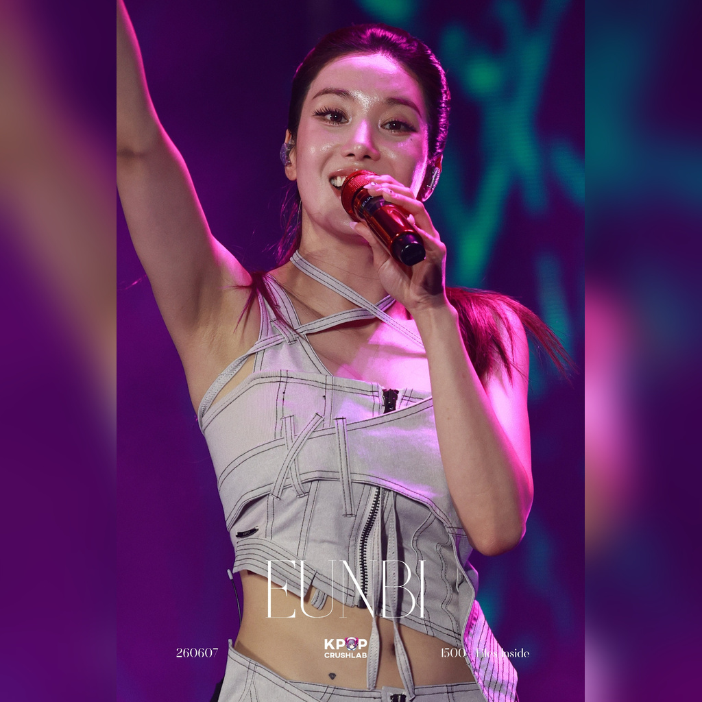 Kwon Eun-bi with a perfect ponytail in a heavy denim halter-neck pheromone look on her thighs