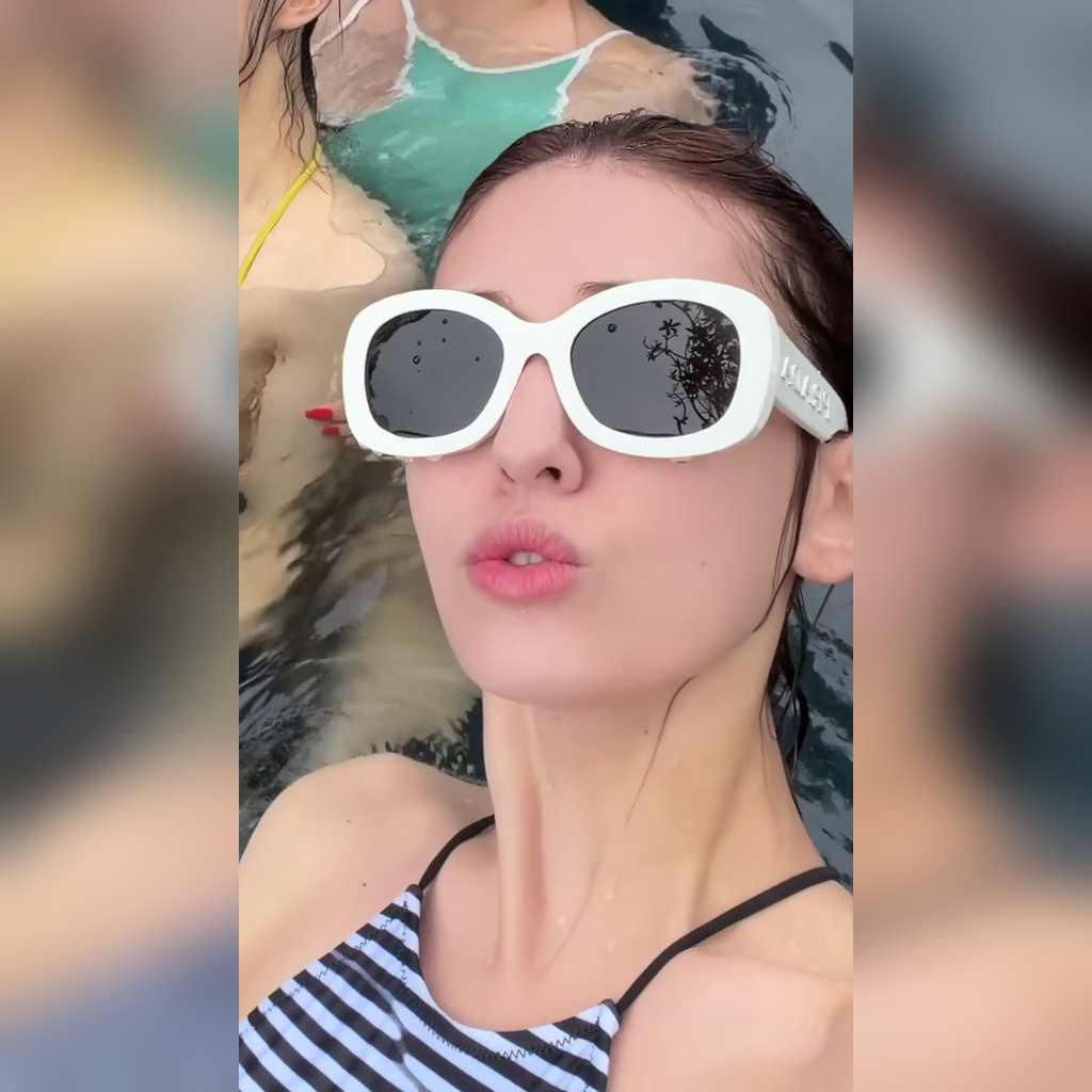 Jeon Somi’s striped halter swimsuit on the cover when she suddenly hits big and goes on an overseas trip